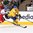 TORONTO, CANADA - DECEMBER 26: Sweden's Anton Blidh #11 skates with the puck while Czech Republic's Jan Stencel #20 chases him down during preliminary round action at the 2015 IIHF World Junior Championship. (Photo by Andre Ringuette/HHOF-IIHF Images)

